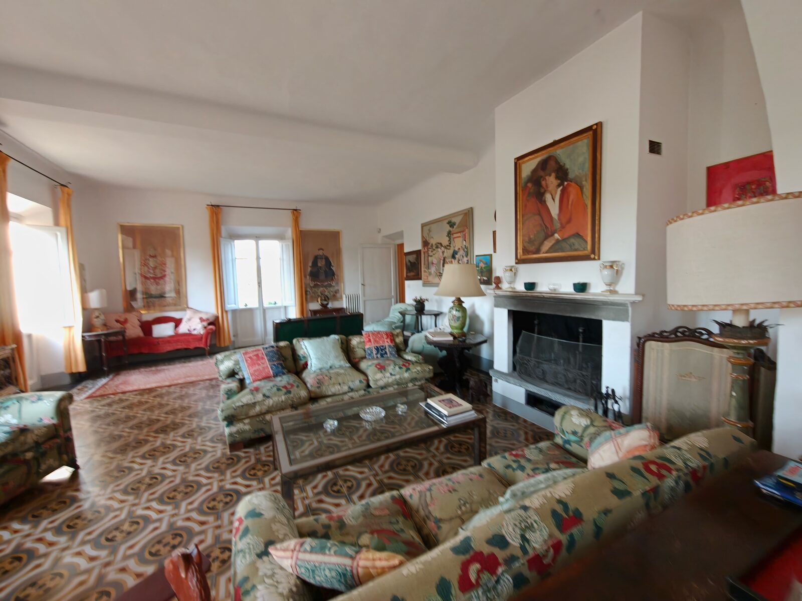 Living room with fireplace and patterned floor